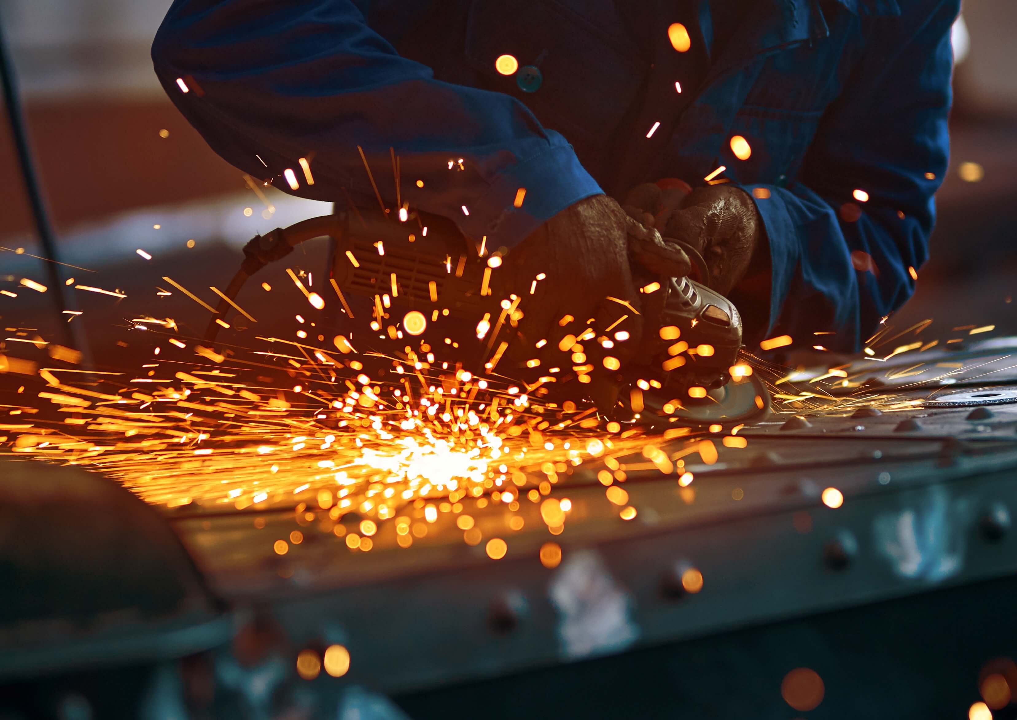 process-creating-modern-fence-with-orange-sparks (1) magenta-engineering-metal-fabrication